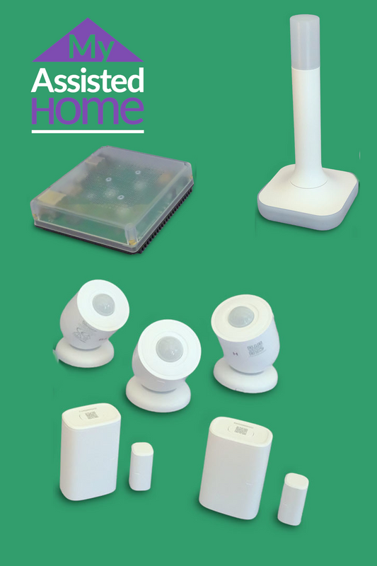 A set of white smart home devices arranged on a solid green background, including several round and cylindrical sensors, a rectangular base unit, a small cylindrical wireless unit. A purple and white 'My Assisted Home' logo is visible in the top-left corner.